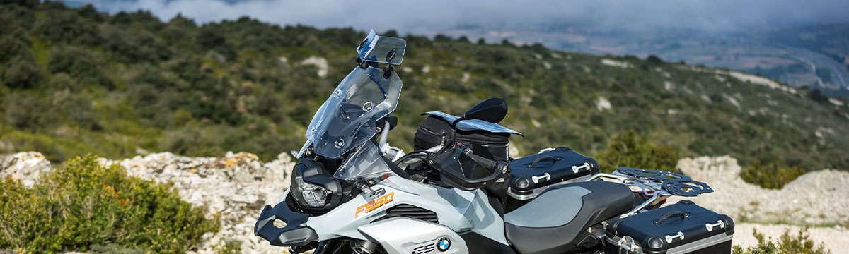The Touratech windscreen spoiler is a useful addition to your motorcycle windscreen. This small spoiler is attached to the fairing windscreen and provides additional wind protection.